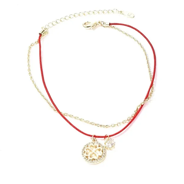 Bracelet souple breloques trèfle fil nylon rouge